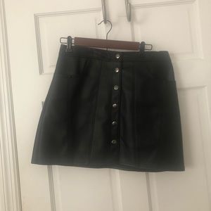 Black leather mini skirt